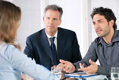 A married couple discussing options to deal with a deportation order A married couple discussing options to deal with a deportation order