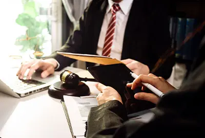 Lawyers discussing the defining issues in the Pereira Hearings processes