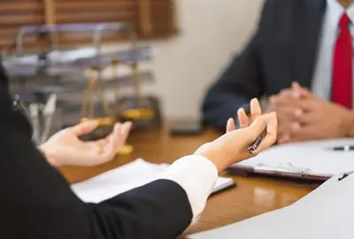 Lawyers discussing the impact of deportation on immigration status in the United States